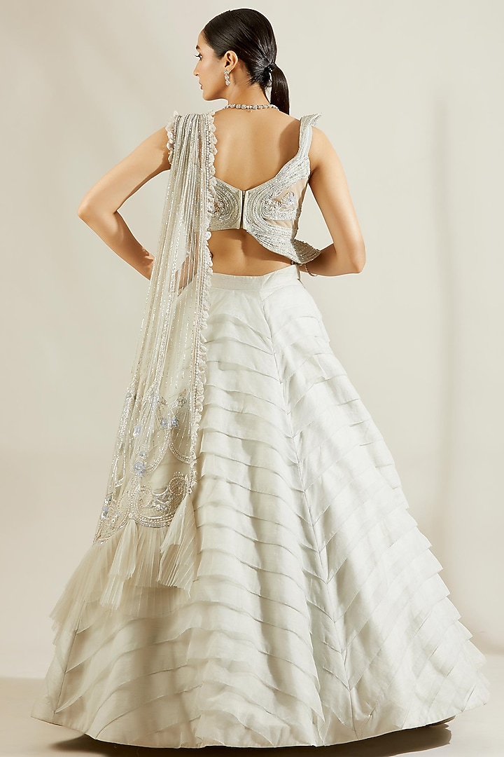 Powder Blue Hand Embroidered Layered Wedding Lehenga Set by Adaara Couture at Pernia's Pop Up Shop