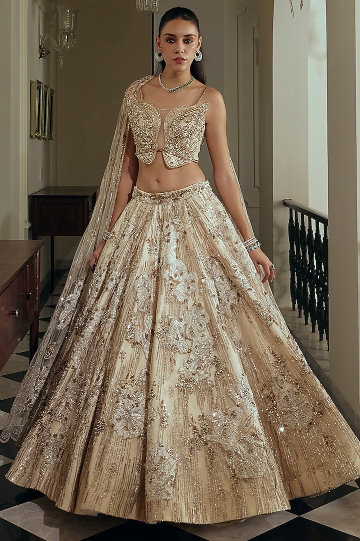 Champagne Gold Net & Bamberg Silk Sequin Embroidered Bridal Lehenga Set by Adaara Couture at Pernia's Pop Up Shop