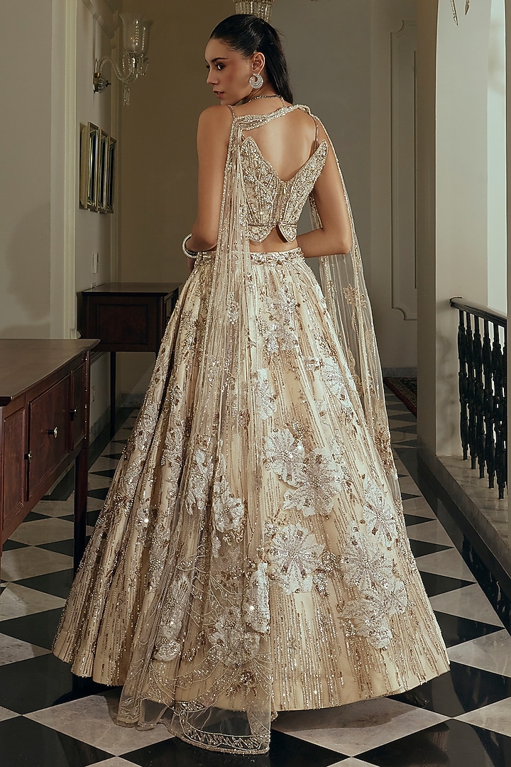 Champagne Gold Net & Bamberg Silk Sequin Embroidered Bridal Lehenga Set by Adaara Couture at Pernia's Pop Up Shop