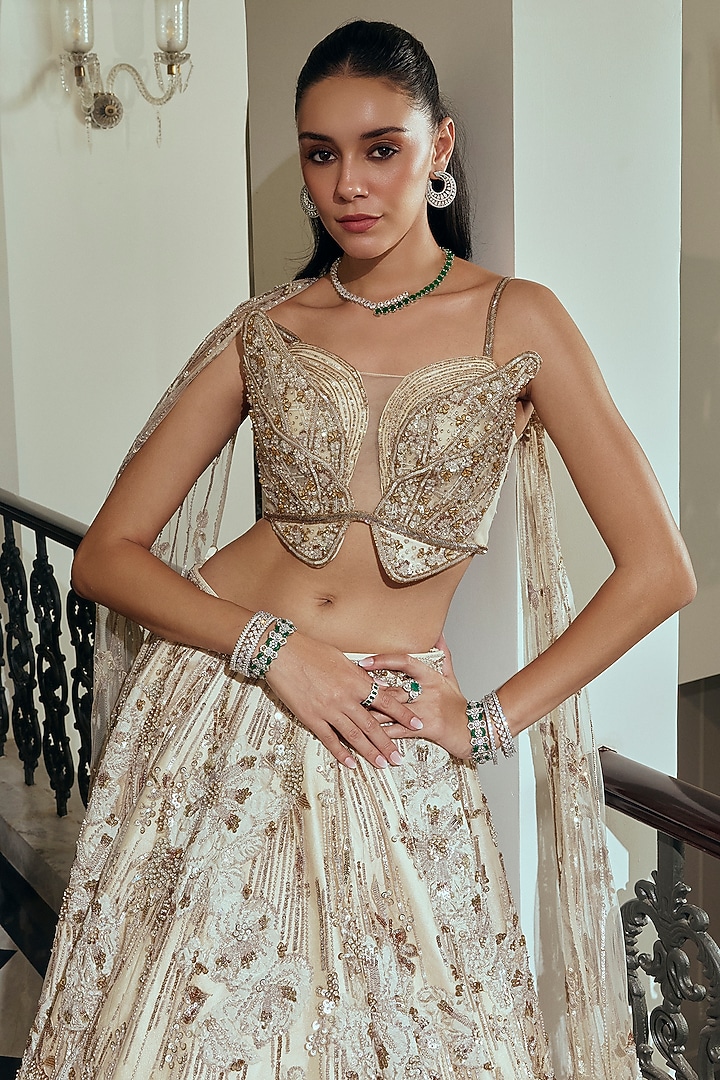 Champagne Gold Net & Bamberg Silk Sequin Embroidered Bridal Lehenga Set by Adaara Couture at Pernia's Pop Up Shop