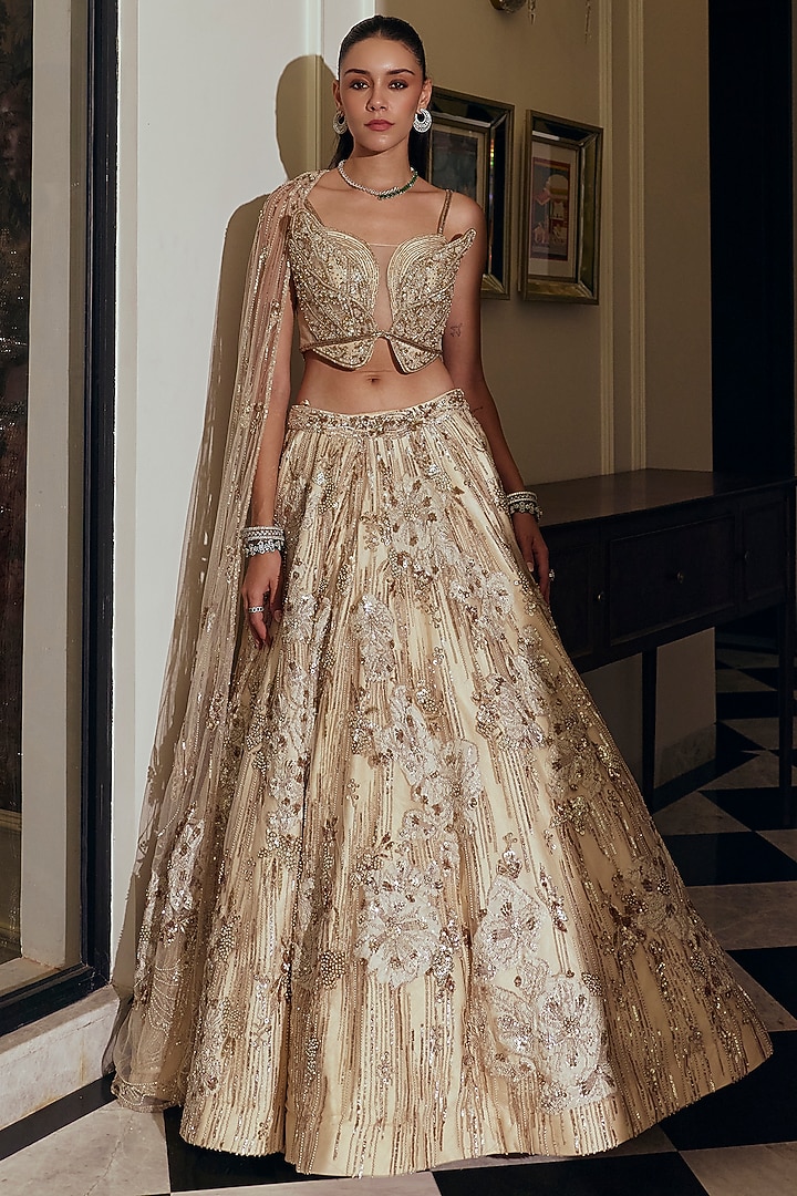 Champagne Gold Net & Bamberg Silk Sequin Embroidered Bridal Lehenga Set by Adaara Couture at Pernia's Pop Up Shop
