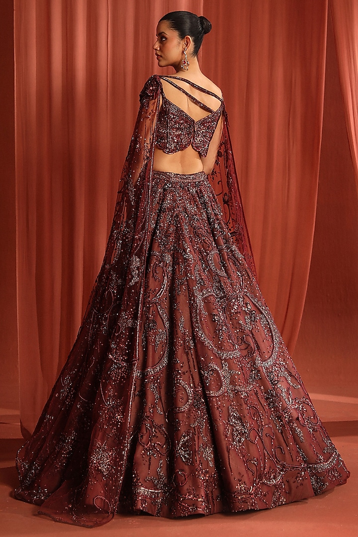Dark Raspberry Net Crystal & Sequins Embroidered Bridal Lehenga Set by Adaara Couture at Pernia's Pop Up Shop
