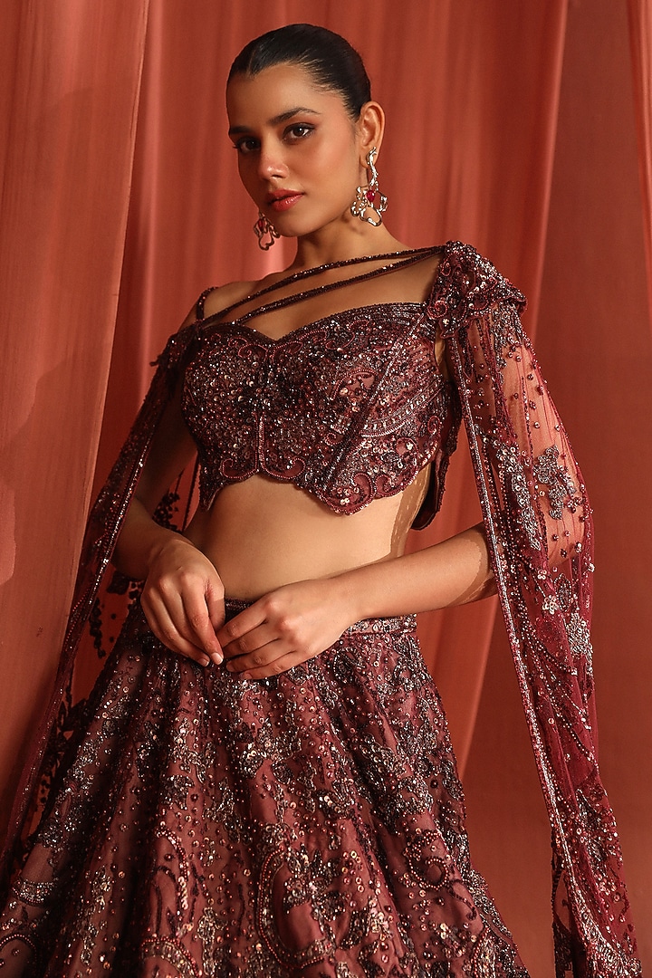 Dark Raspberry Net Crystal & Sequins Embroidered Bridal Lehenga Set by Adaara Couture at Pernia's Pop Up Shop