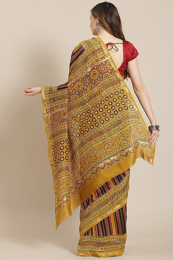 Mustard Ajrakh Printed Festive Saree With Blouse Piece by Aditri at Pernia's Pop Up Shop