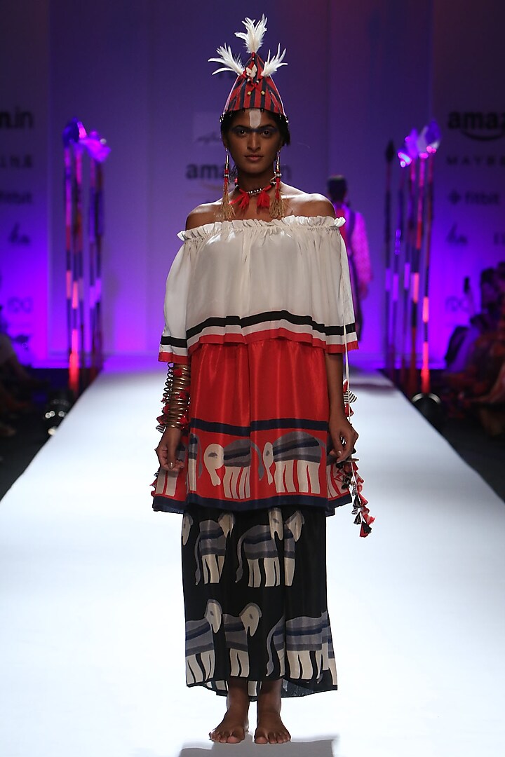 Red, black and white three tier elephant printed off shoulder dress by Anupamaa Dayal