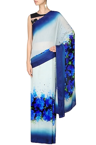 Off white and blue "Indigo" floral handpainted saree with an unstitched blouse piece by Aadi Shop By Shalini