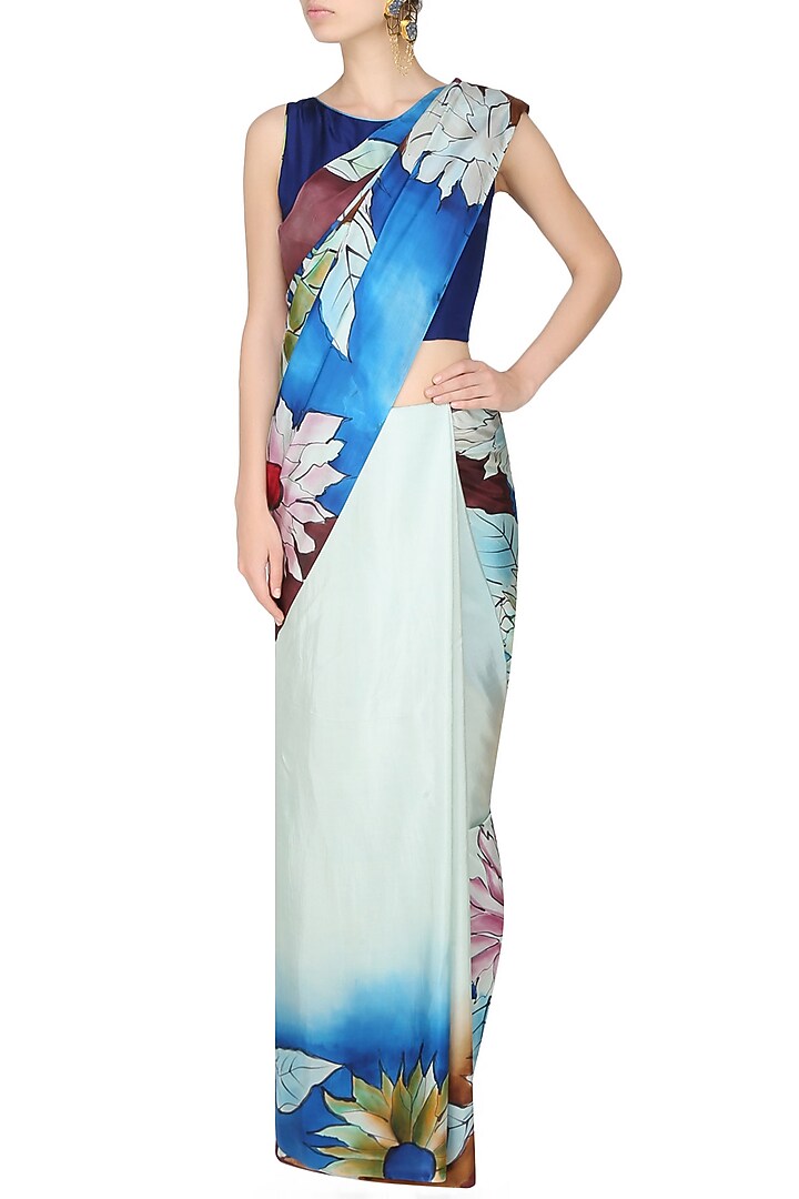 AADI SHOP by Shalini presents Pastel blue "Iris" floral handpainted saree with an untitched blouse piece available only at Pernia's Pop Up Shop.