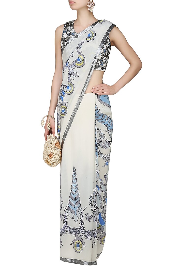 AADI SHOP by Shalini presents Off white and blue "Orchid" floral handpainted saree and embroidered blouse set available only at Pernia's Pop Up Shop.