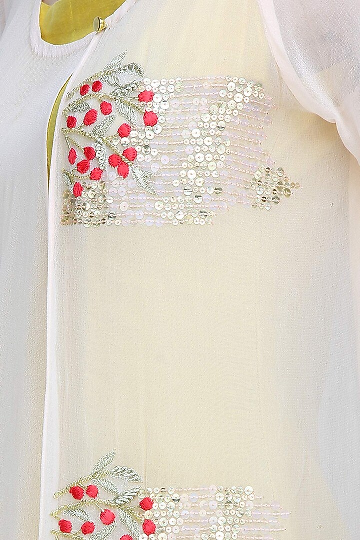 Anshul Apoorva-The DramaQueens presents Light peach embroidered kurta with mustard inner layer available only at Pernia's Pop Up Shop.