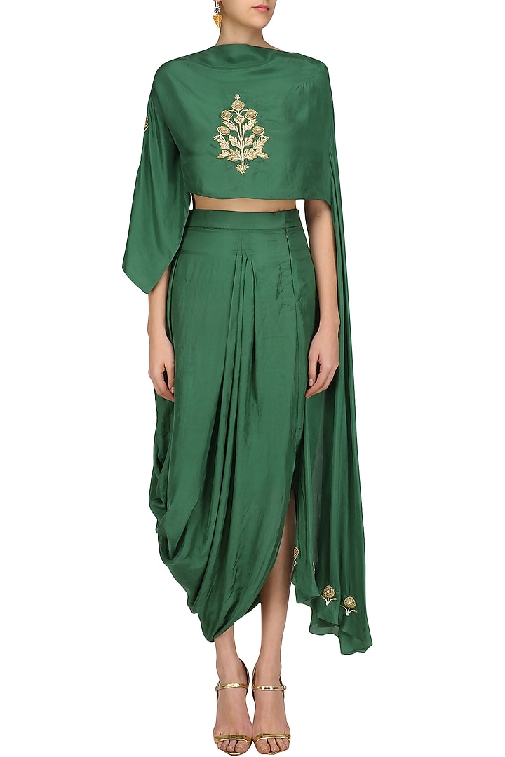 Green floral embroidered top with asymmetric skirt available only at Pernia's Pop Up Shop.
