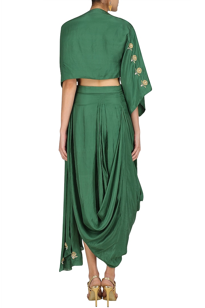 Green floral embroidered top with asymmetric skirt available only at Pernia's Pop Up Shop.