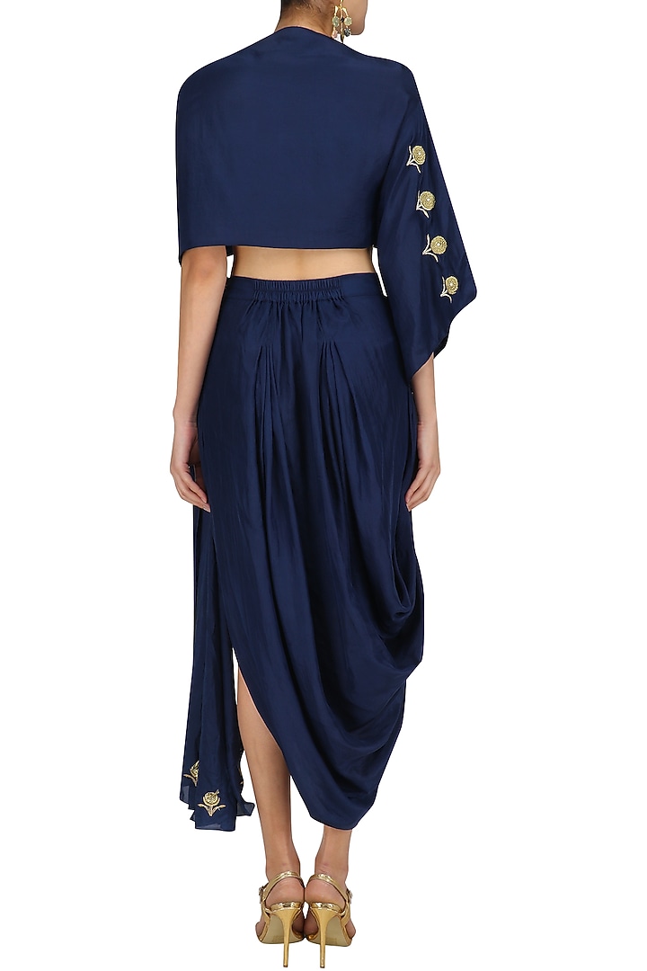 Blue floral embroidered top with asymmetric skirtavailable only at Pernia's Pop Up Shop.