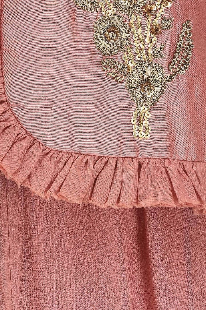Salmon embroidered frill jacket and skirt set available only at Pernia's Pop Up Shop.