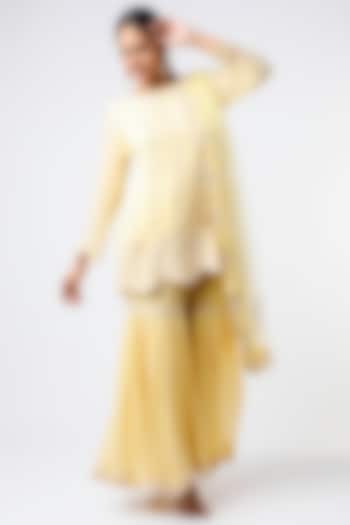 Yellow Georgette Net Thread Embroidered Gharara Set by anuradha grewal