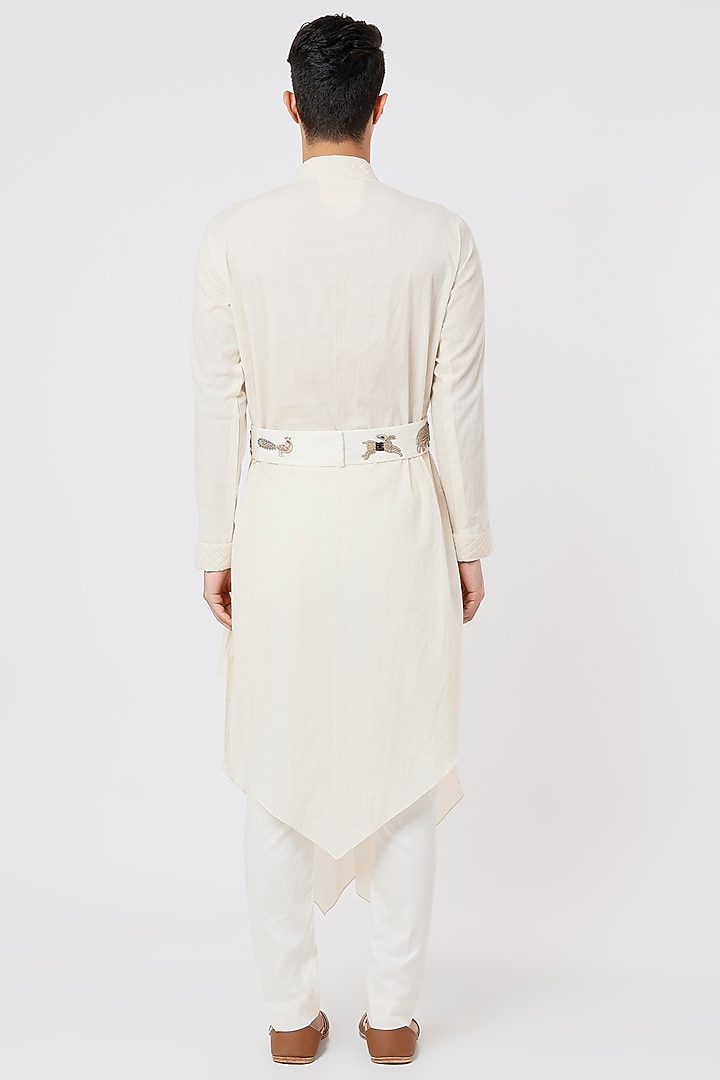 Ivory Draped Kurta Set With Hand Embroidered Work Belt by AGRAJAIN at Pernia's Pop Up Shop