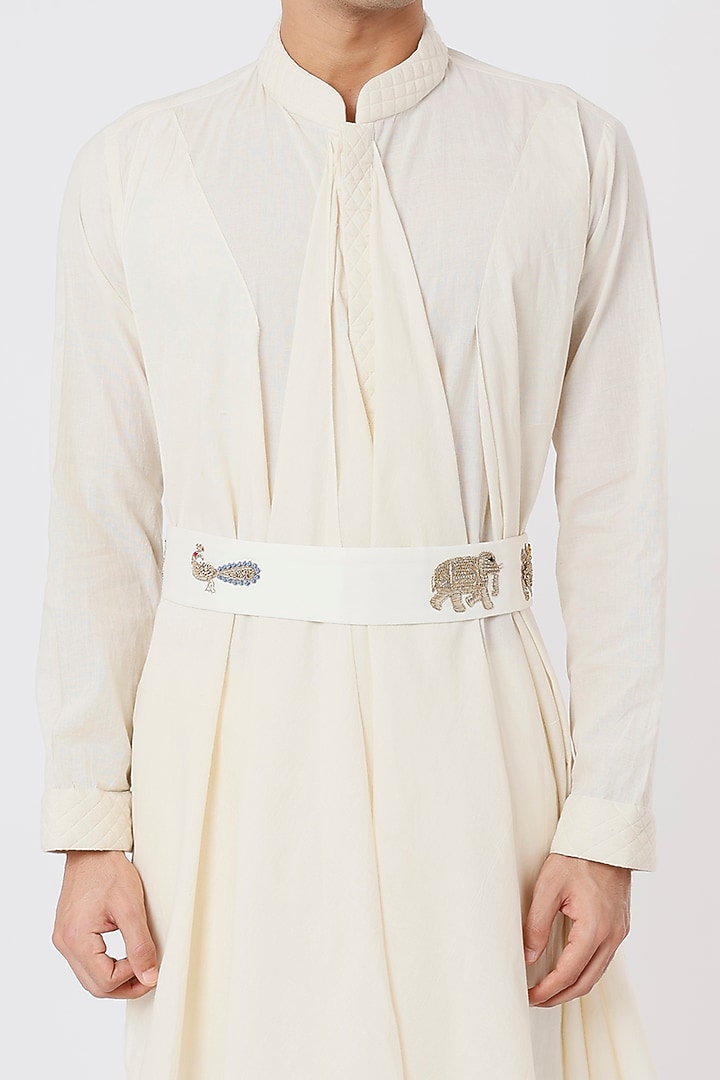 Ivory Draped Kurta Set With Hand Embroidered Work Belt by AGRAJAIN at Pernia's Pop Up Shop
