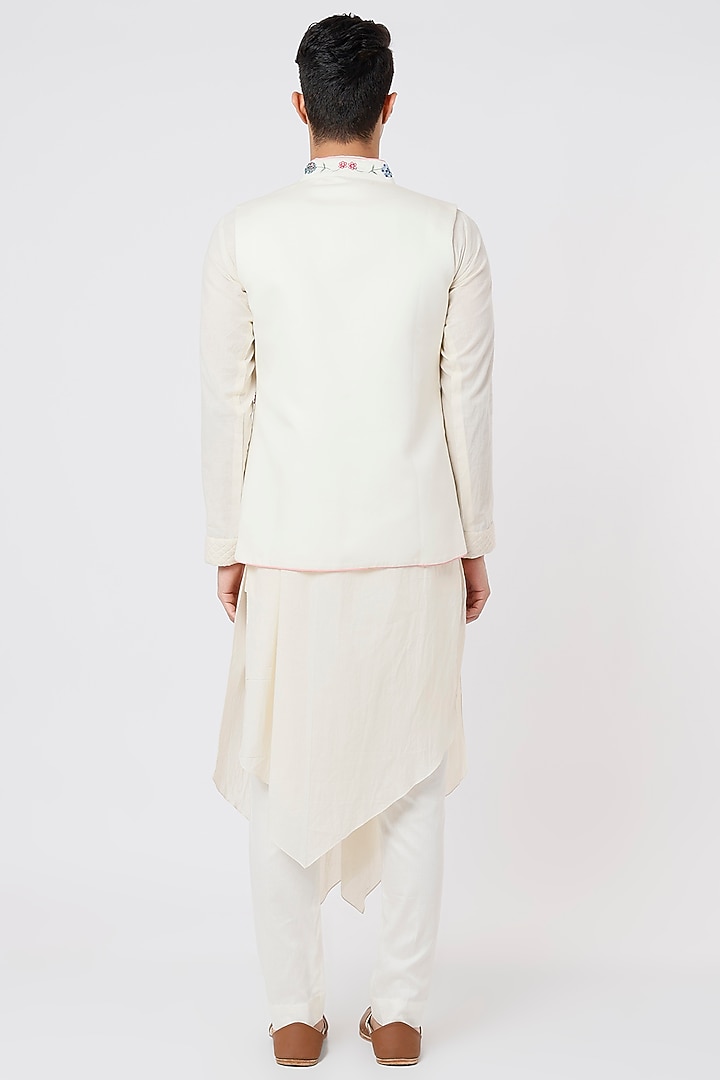 Ivory Draped Kurta Set With Nehru Jacket by AGRAJAIN at Pernia's Pop Up Shop