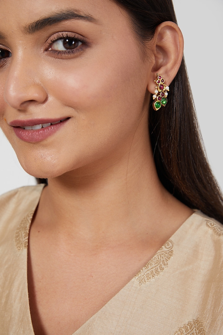 Gold Finish Jhumka Earrings by Aaharya