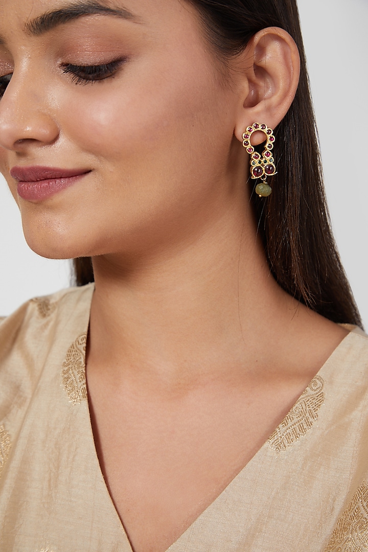 Gold Finish Temple Earrings by Aaharya