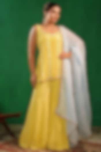 Pastel Yellow Crepe & Organza Embellished Kurta Set by AHI CLOTHING at Pernia's Pop Up Shop