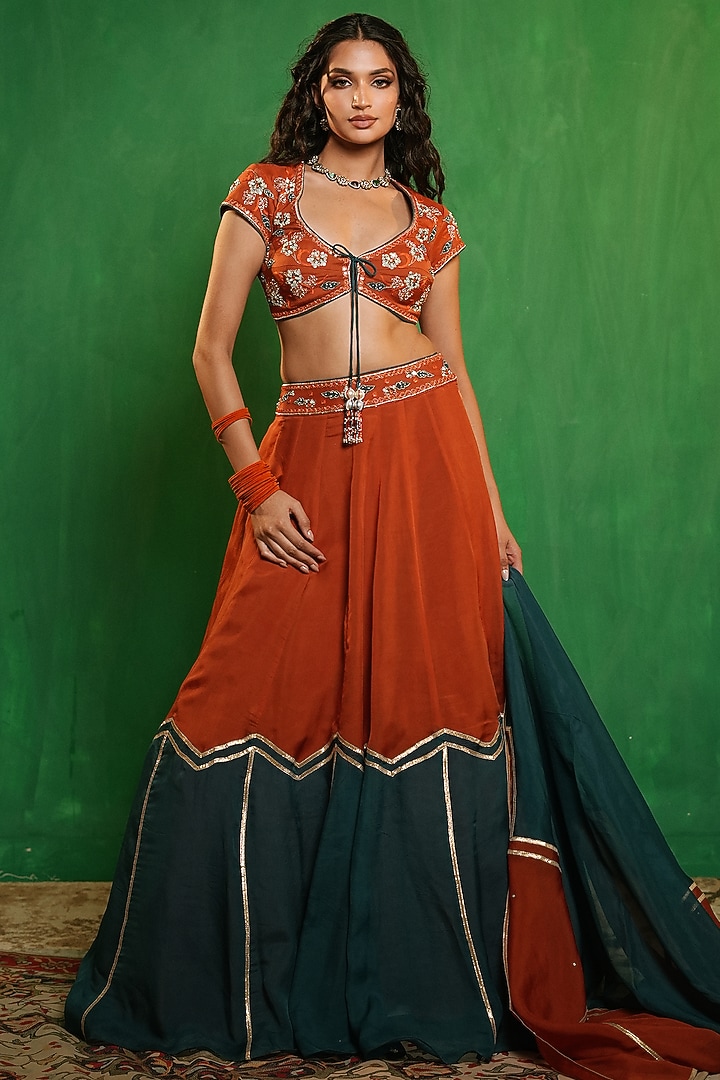 Rust & Teal Heavy Organza Embellished Wedding Lehenga Set by AHI CLOTHING at Pernia's Pop Up Shop