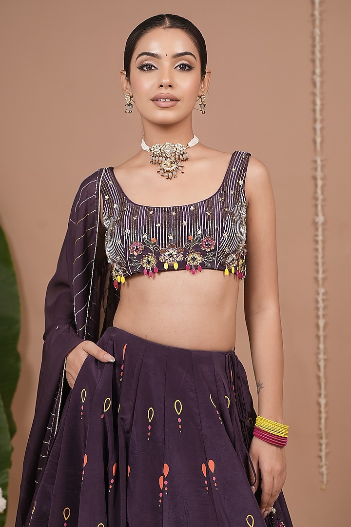 Dark Purple Natural Crepe Motif & Sequin Embroidered Flared Wedding Lehenga Set by AHI CLOTHING at Pernia's Pop Up Shop