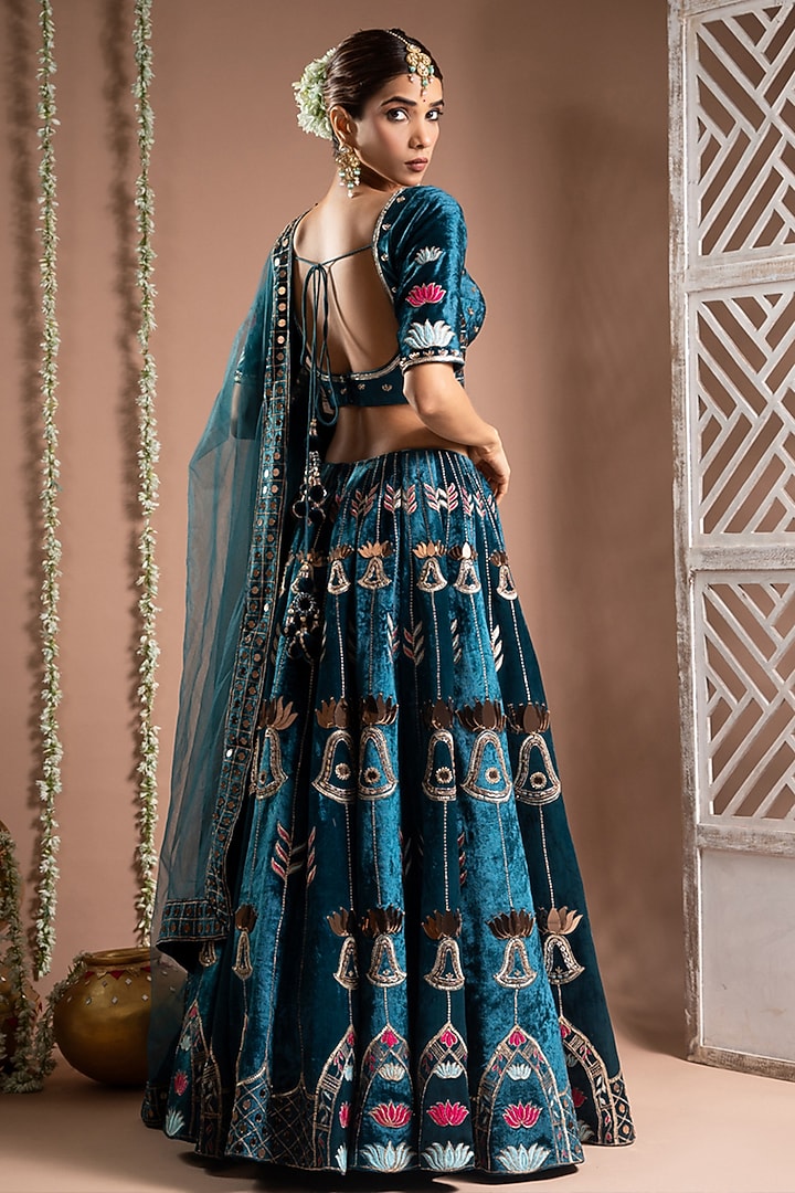 Teal Velvet Zari Hand Embroidered Wedding Lehenga Set by AHI CLOTHING at Pernia's Pop Up Shop