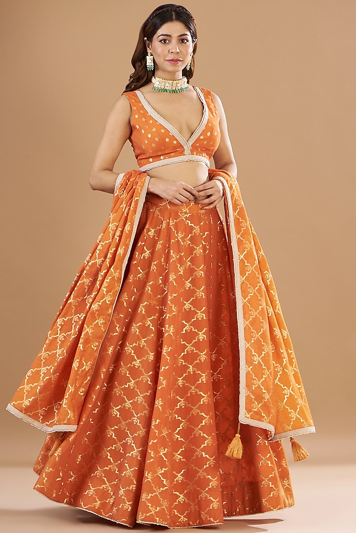 Orange Raw Silk Embroidered Lehenga Set by Aharin India