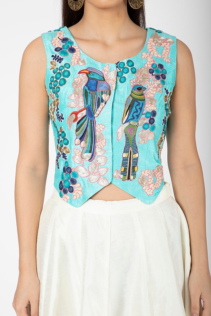 Turquoise Embroidered Jacket With White Lehenga by Aharin India at Pernia's Pop Up Shop