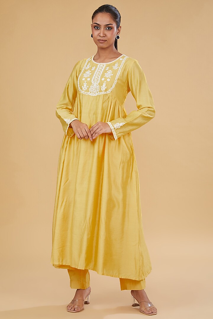 Yellow Cotton Silk Floral Embroidered Kurta Set by Aharin India at Pernia's Pop Up Shop