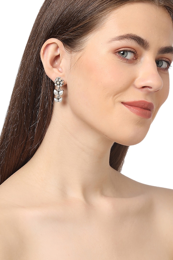 White Pearl Floral Stud Earrings In Sterling Silver by Ahilya Jewels