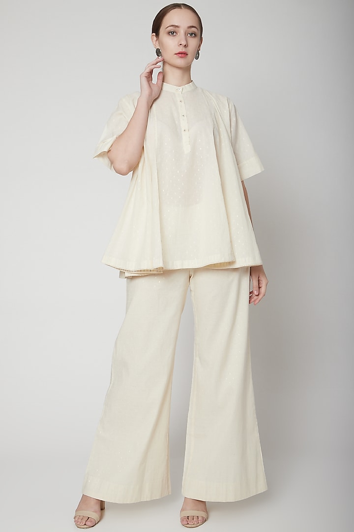 Ivory Palazzo Pants With Mop Buttons by Ahmev