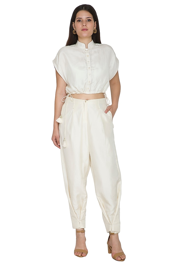 White Pants With Looped Bottom Hem by Ahmev