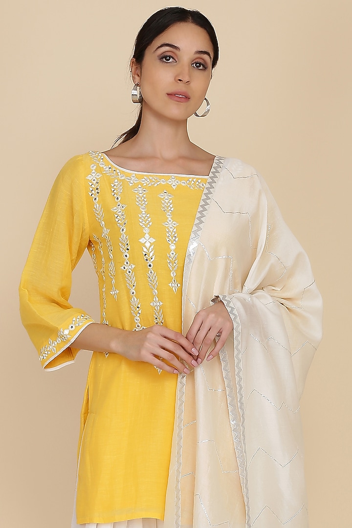 Yellow Chanderi Embroidered Tunic Set by anju & harleen at Pernia's Pop Up Shop