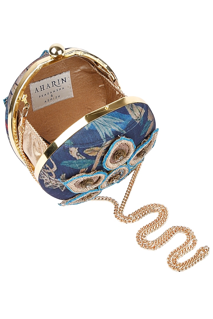 Aharin India presents Navy blue forest print and leaf embroidered box clutch available only at Pernia's Pop Up Shop.