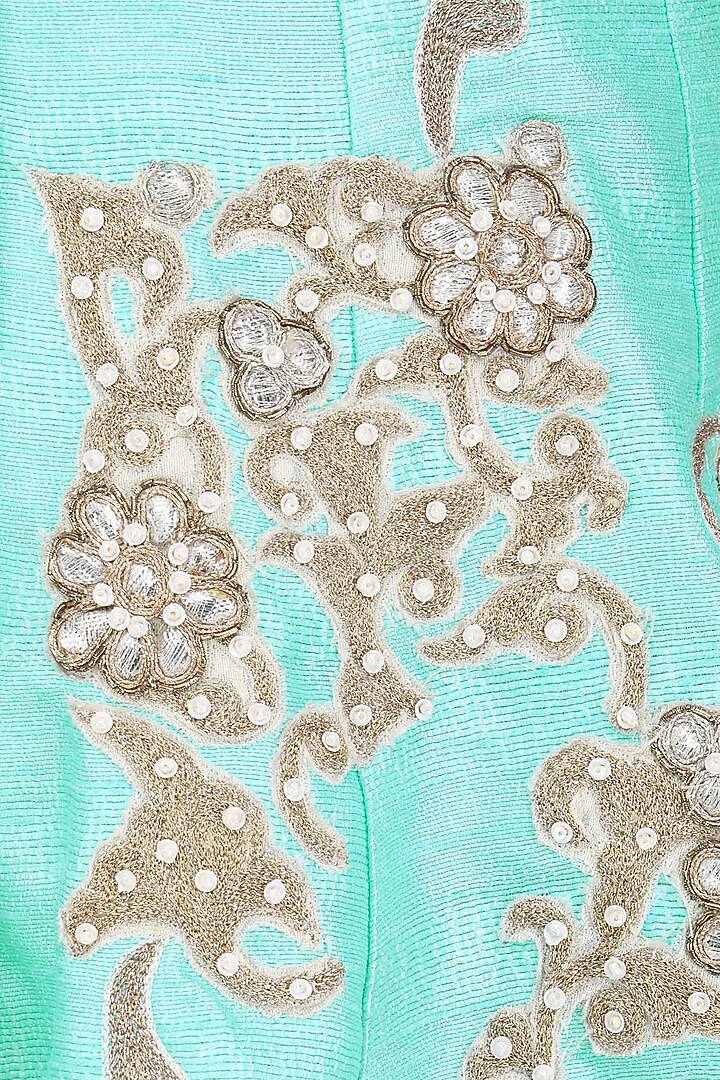 Turquoise embroidered flared jacket with dhoti pants available only at Pernia's Pop Up Shop.