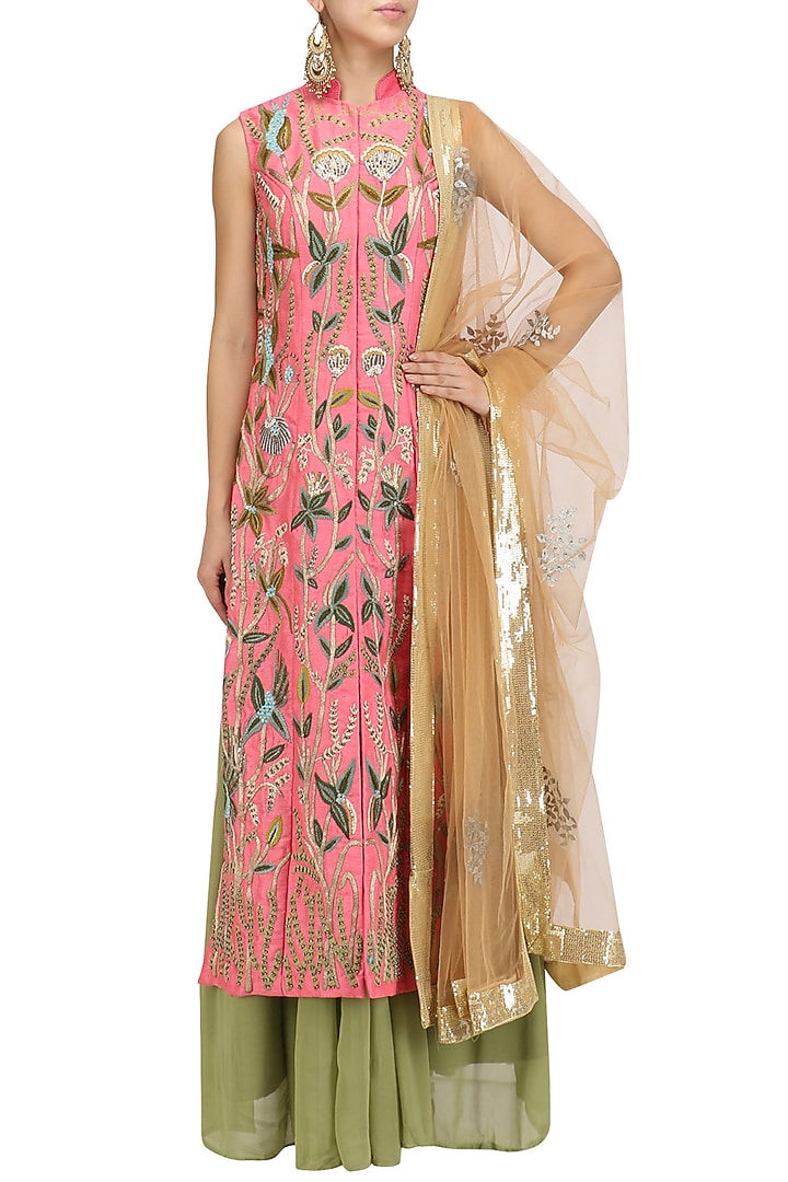 Coral pink jaal embroidered kurta with green lehenga and dupatta set available only at Pernia's Pop Up Shop.