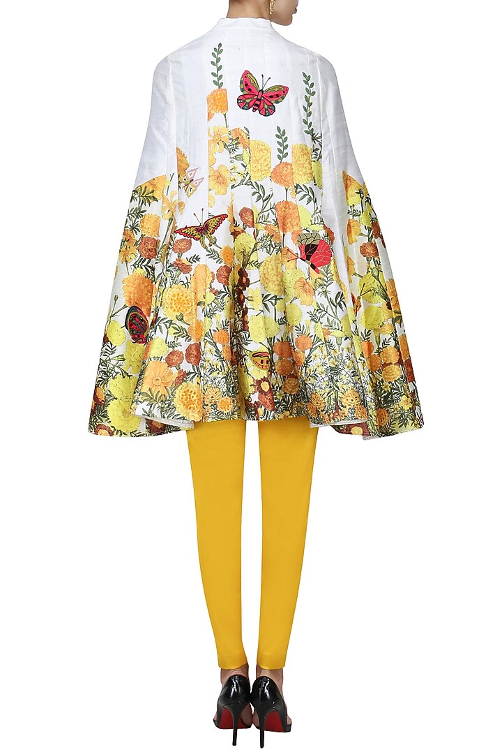 White embroidered cape with yellow fitted pants set available only at Pernia's Pop Up Shop.