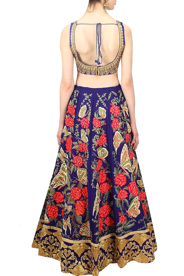Blue butterfly and floral resham and zari embroidered lehenga set available only at Pernia's Pop Up Shop.