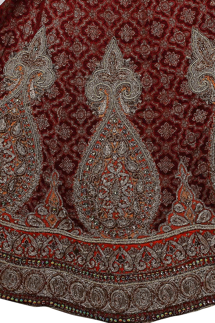 Maroon resham and zari embroidered brocade lehenga and orange blouse set available only at Pernia's Pop Up Shop.
