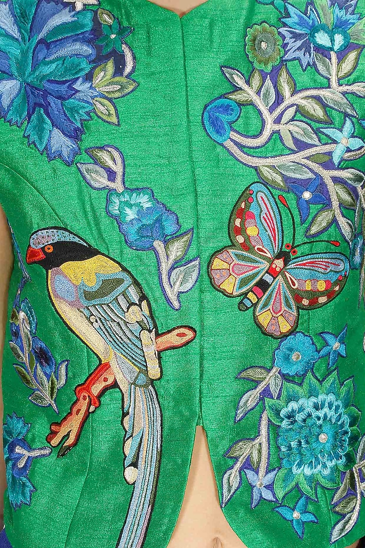 Green bird embroidered short jacket with blue skirt lehenga available only at Pernia's Pop Up Shop.