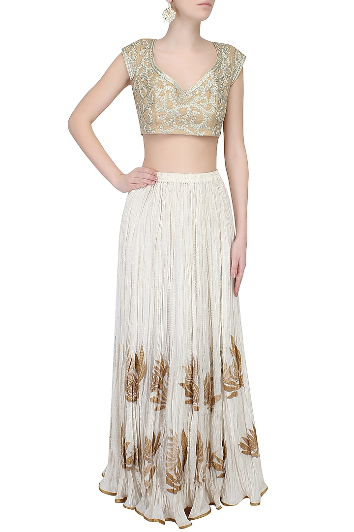 Aharin India presents Dull gold zari thread embroidered leaves pattern blouse available only at Pernia's Pop Up Shop.