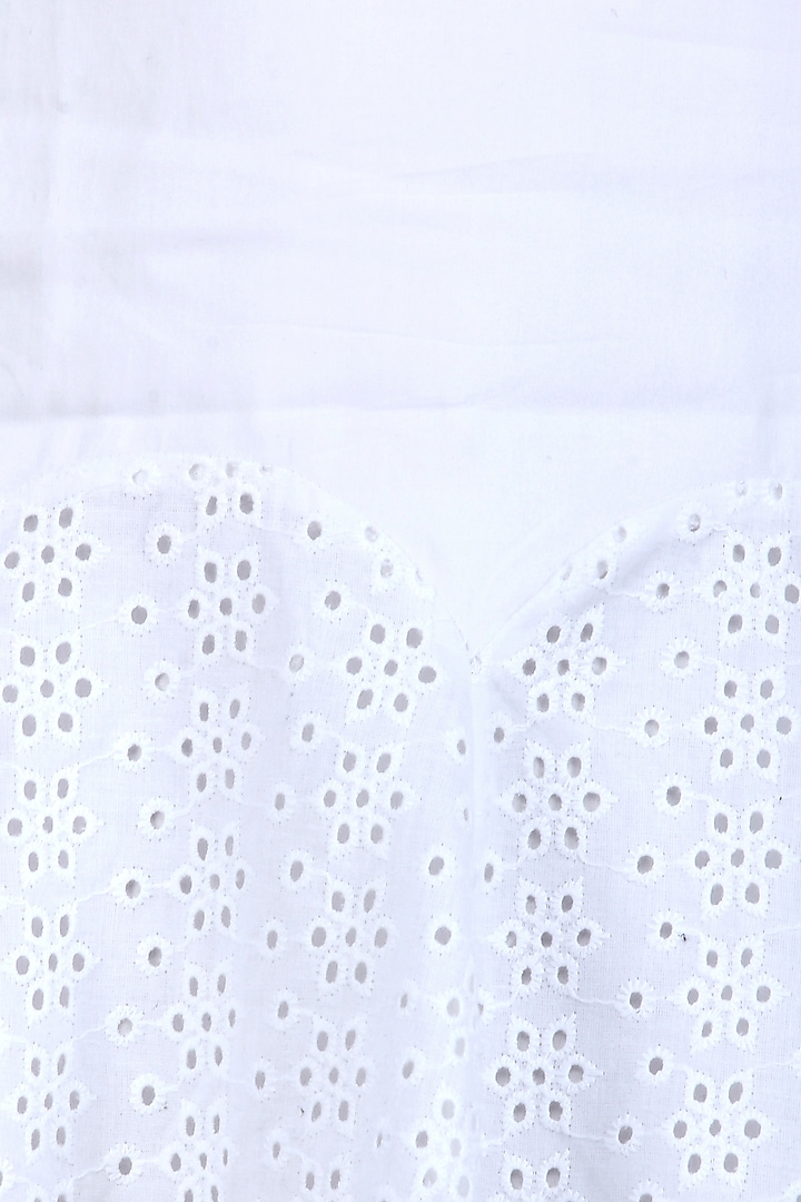 White lace spaghetti strap mini dress available only at Pernia's Pop Up Shop.