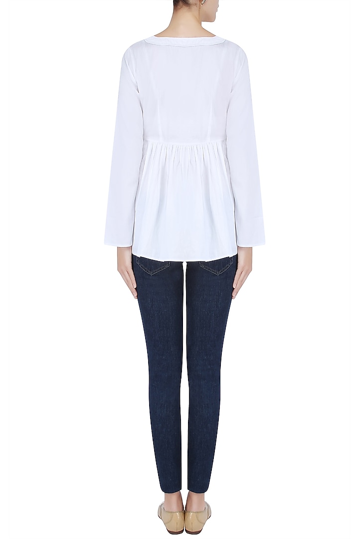 White bell sleeves flared top available only at Pernia's Pop Up Shop.