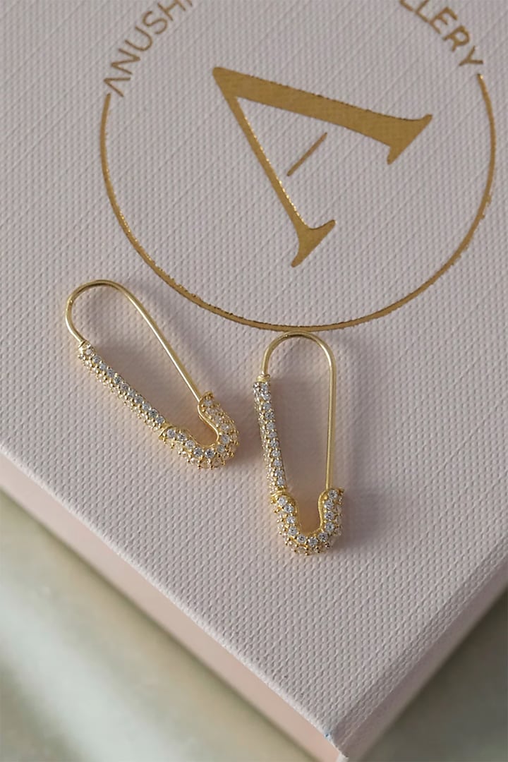 Gold Finish Zircon Safety Pin Dangler Earrings In Sterling Silver by Anushka Jain