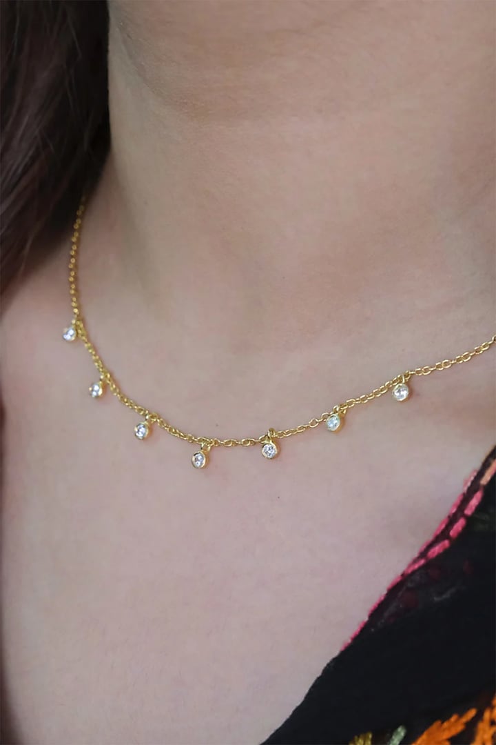 Gold Finish Zircon Necklace In Sterling Silver by Anushka Jain