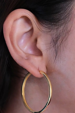Gold Finish Hoop Earrings In Sterling Silver by Anushka Jain