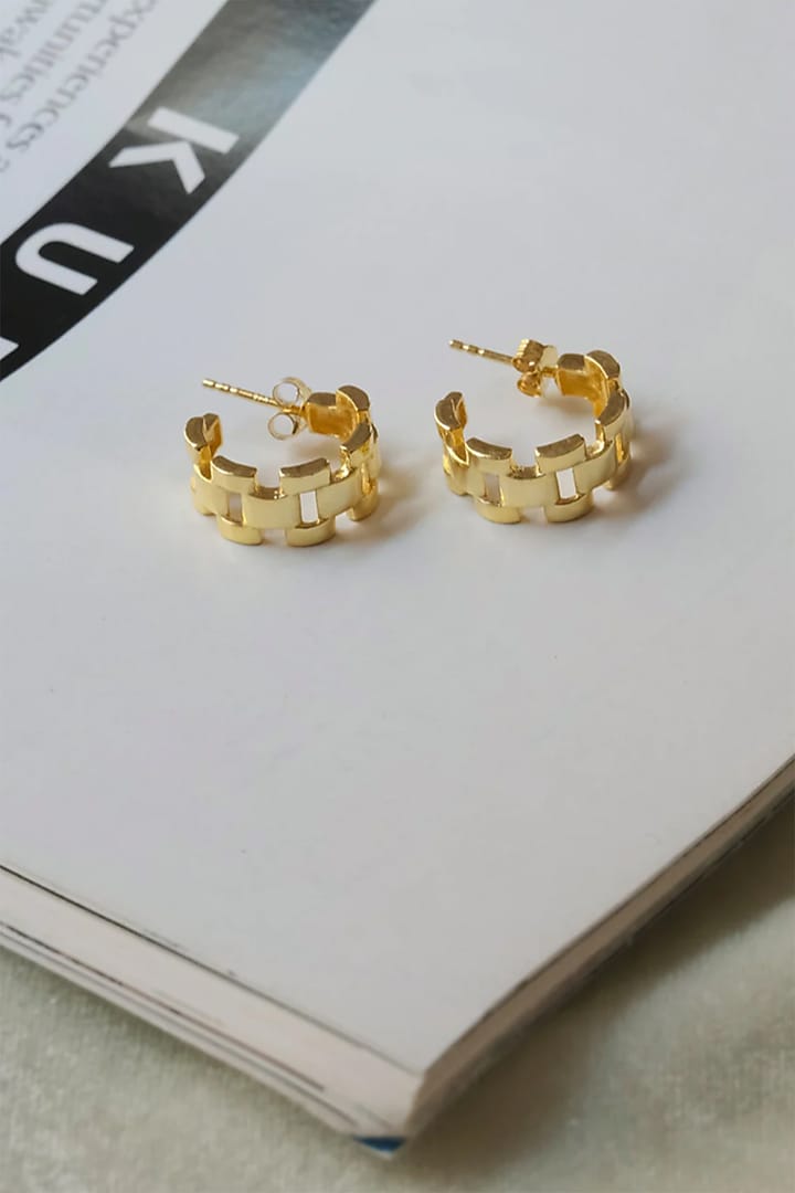 Gold Finish Hoop Earrings In Sterling Silver by Anushka Jain at Pernia's Pop Up Shop