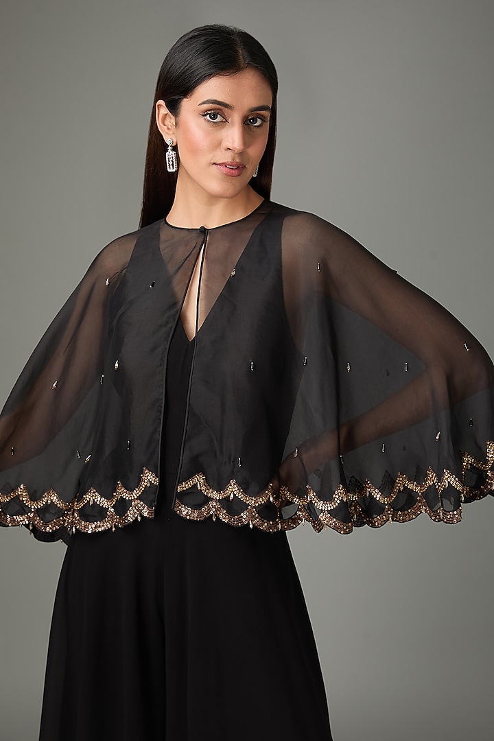 Black Polyester Silk Flared Jumpsuit With Circular Cape by Anjali Kanwar at Pernia's Pop Up Shop