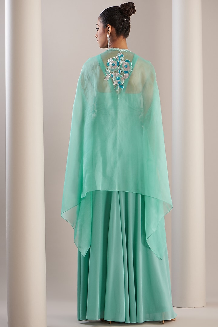 Green Polyester Crepe Jumpsuit With Embroidered Cape by Anjali Kanwar at Pernia's Pop Up Shop